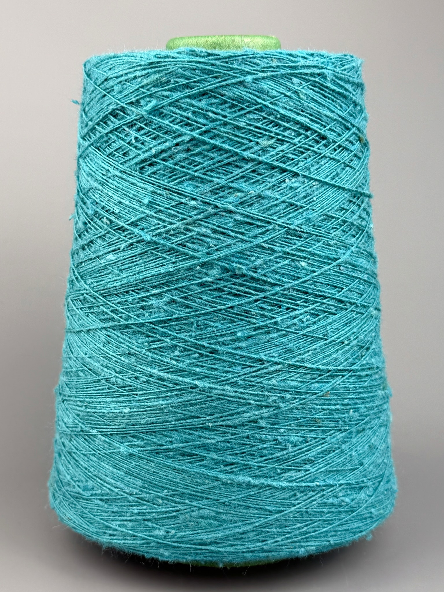 Art. Seta Tweed Bourette – Garn aus 100 % Bouretteseide mit Tweed-Effekt col. Türkis 700 m / 100 g foto 2